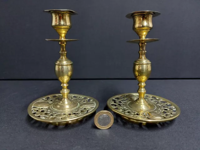 A Lovely Pair of Antique Pierced Brass Candlesticks