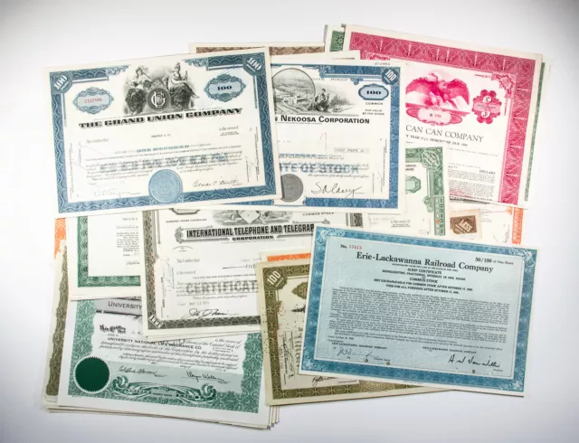 50 diff. old USA paper stocks & bonds certificates nice used and unused