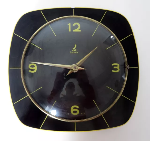 Pendule horloge formica vintage - JAZ - noir jaune aux lignes - Années 1961