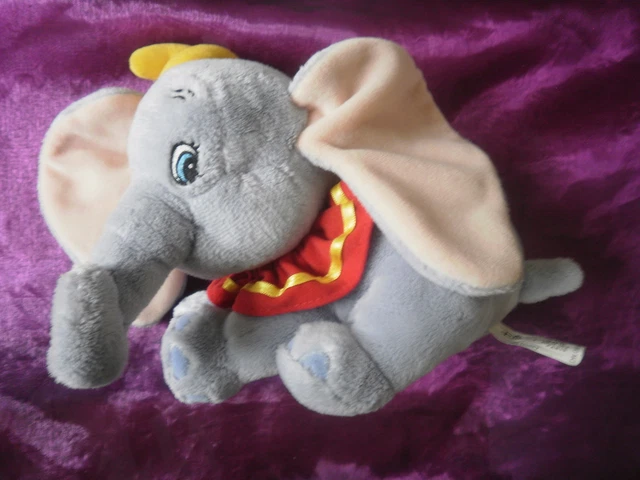Doudou peluche dumbo elephant bleu jaune rouge  disneyland resort DISNEY