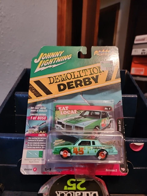Johnny Lightning 1:64 1982 Pontiac Grand Prix Stock Car in with Orange Graphics- Demolition