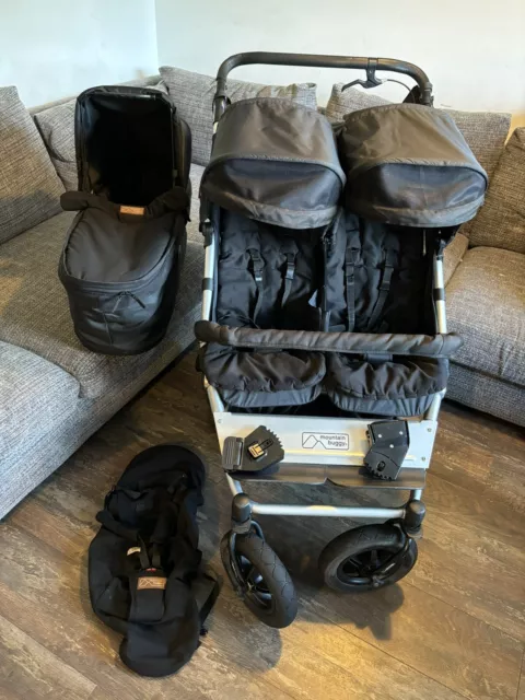 Mountain Buggy Duet V3.2. Black. Comes with Carrycot Plus.