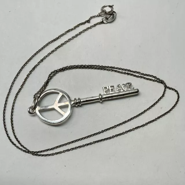 Nadri sterling silver peace key pendant necklace peace sign Nadri sterling silver peace key pendant necklace peace sign