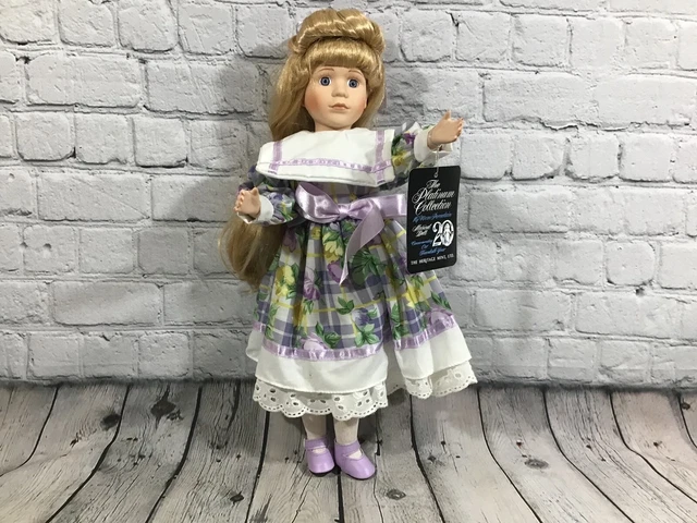 The Platinum  Collection  Commemorative  20 year "Musical  Porcelain doll"