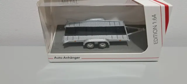 Twin axle trailer. Schuco model.  1/64 scale.