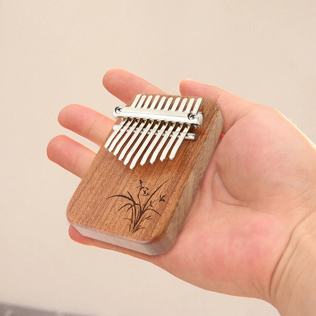 10 Key Finger Thumb Piano Keyboard Percussion Instrument (Brown)
