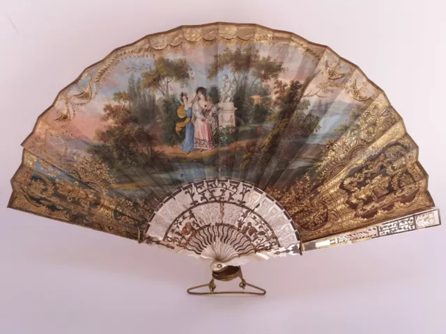 19th C. VICTORIAN FRENCH  MOTHER OF PEARL & HAND PAINTED PAPER BRISE FAN.