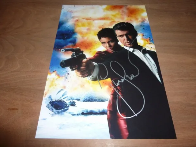 PIERCE BROSNAN signed 12X8 photo JAMES BOND 007 + COA