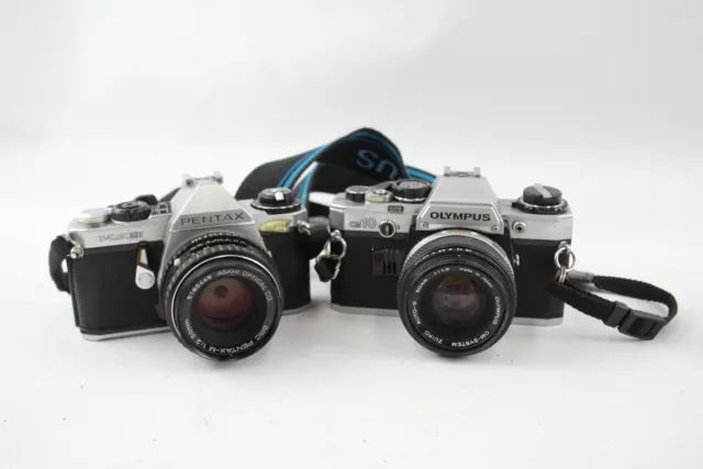 2 x SLR FILM CAMERAS Inc. Olympus OM10 & Pentax ME Super w/ Both Lenses