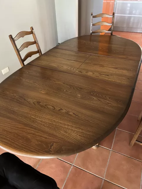 ercol dining table and 6 chairs