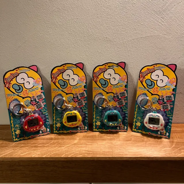 Tamagotchi -Dinkie Dino/Rakuraku Dinokun - NEU+ORIGINALVERPACKT