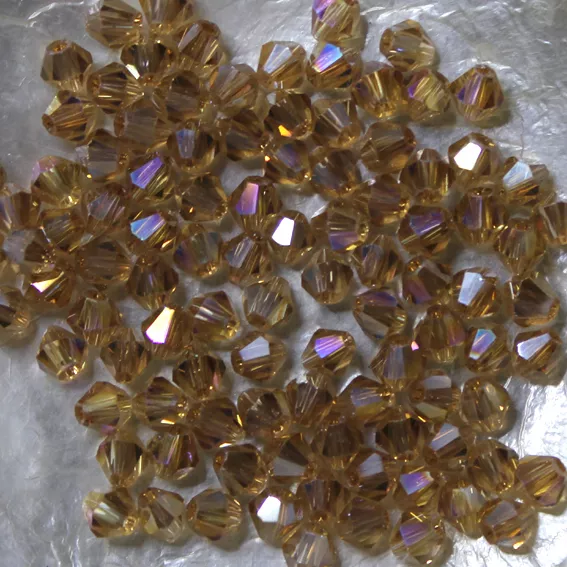 25 Perles Cristal -TOUPIES SWAROVSKI - GOLD CHAMPAGNE "AB"     - 4 mm