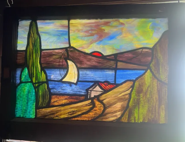 Nice scenic stained glass window with sailboat