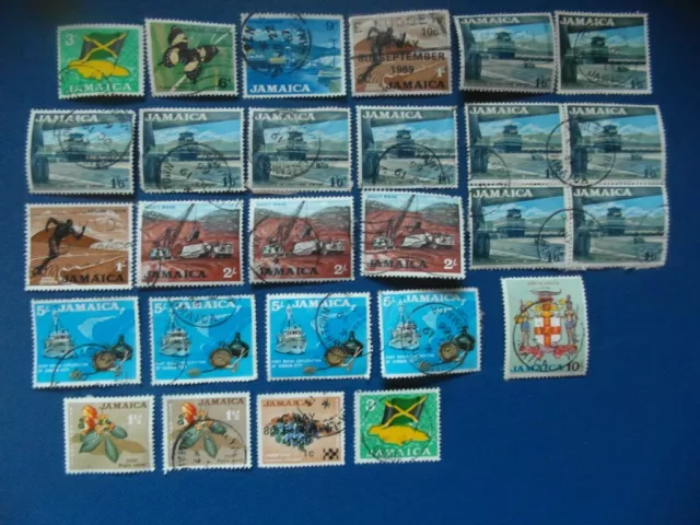 Stamps Jamaica QEII pictorial defs.1964 +currency day 1969 (2) cv£11.3o