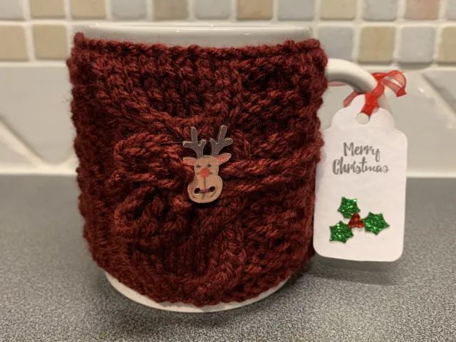 Hand Knitted Burgundy Christmas Mug Cosy With Cute Reindeer Button