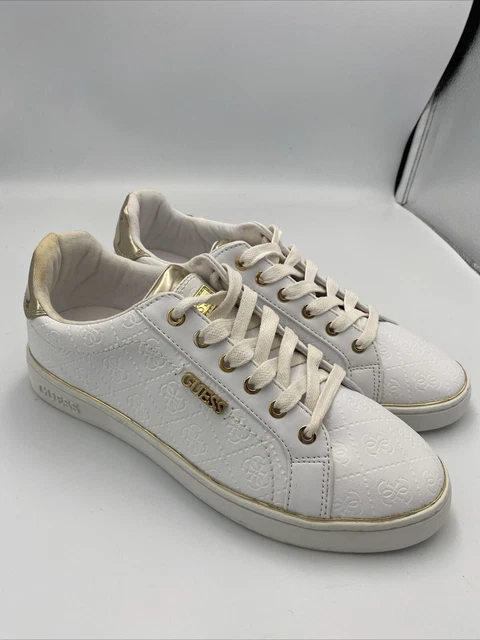 Guess white and gold trainers on sale