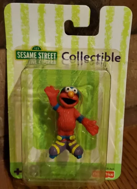 Fisher Price Sesame Street ELMO Collectible Figure Hockey Player 2.5" Baby Toy