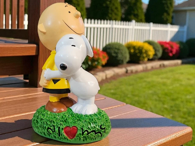 Statue de Charles M Schulz Peanuts Snoopy et Charlie Brown caractères