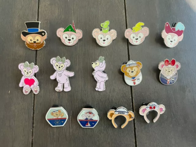 14 Piece Lot Of Disney Trading Pins Duffy Bear theme What You See What You Get