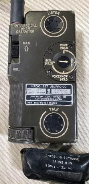 AN/PRC-90 Military Survival Radio, earpiece, batteries, and battery adapter