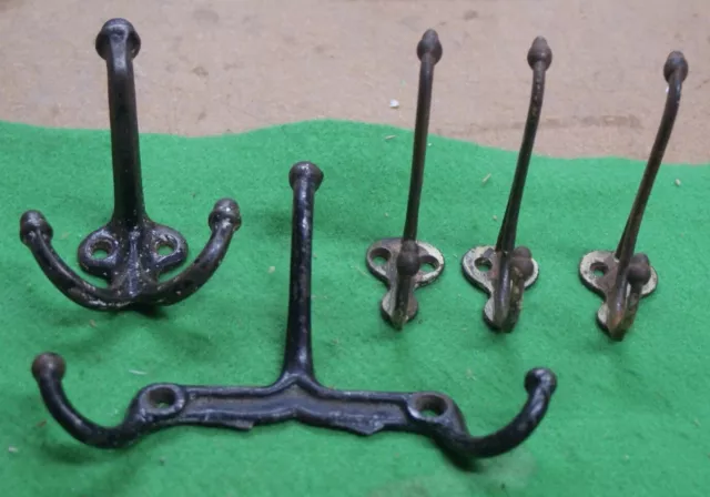 LOT 5 ANTIQUE CAST IRON COAT and or HAT HOOKS vqs
