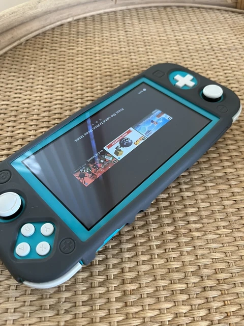 Nintendo Switch Lite Handheld Console - Turquoise Charger And Silicone Case