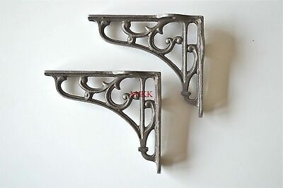 A pair of small Victorian scrolled cast iron brackets 4 inch wall shelf bracket