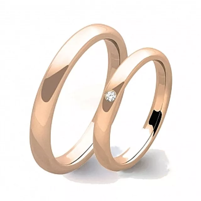 COPPIA DI FEDI in oro rosa 9 carati con diamante. Fedi nuziali