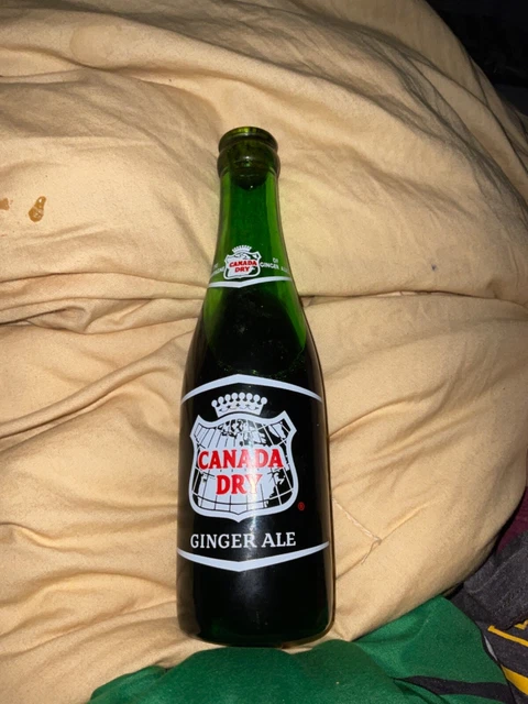 Vintage old canada dry bottle filled
