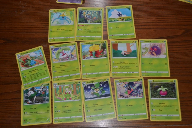 13 green Pokémon playing/collecting cards