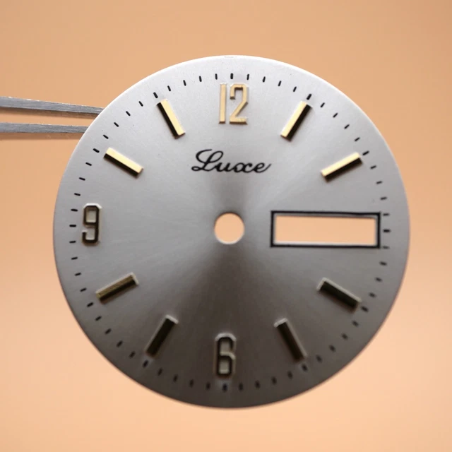 CADRAN MONTRE CAL. FE 68 DORE HAUTEUR 15.70 LARGEUR 18.30 MM