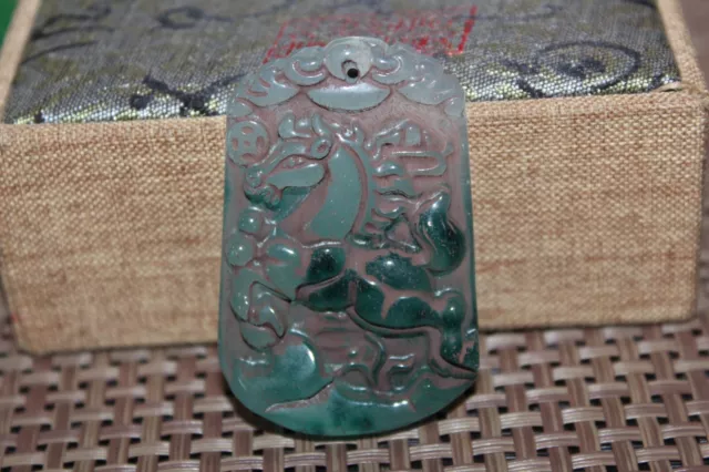 Chinese master hand-carved jade pendant