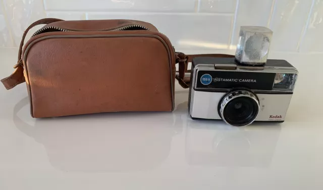 Kodak Instamatic Vintage camera With Sylvania Magic Cube And Brown Kodak Case