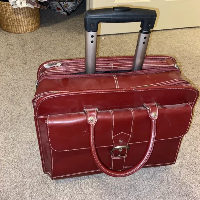 Franklin Covey rolling briefcase laptop carry-on bags for Sale in