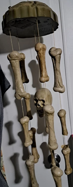 GEMMY Shaking Skull Bones Haunted Wind Chimes Lights Sound Motion Halloween Work