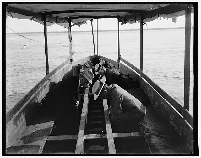 Viewing the marine gardens through bottom of boat,Nassau, Bahamas 1900 Old Photo