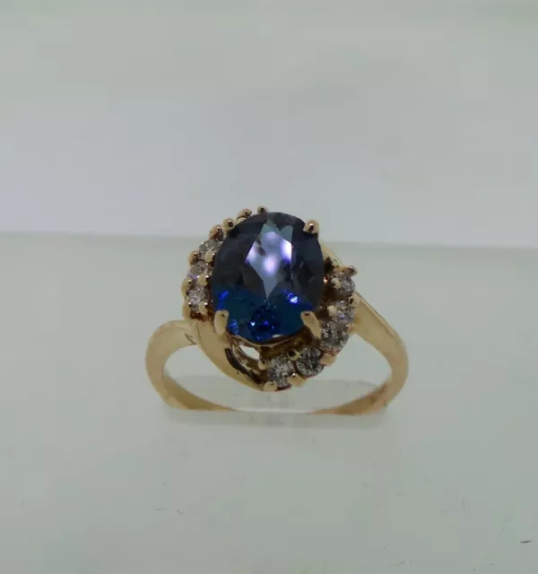 Belle bague en or jaune 14 carats topaze bleue et diamant véritable 2