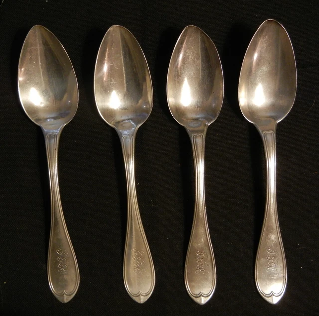 Four James Conning dessert coin silver spoons in the Oval Thread pattern