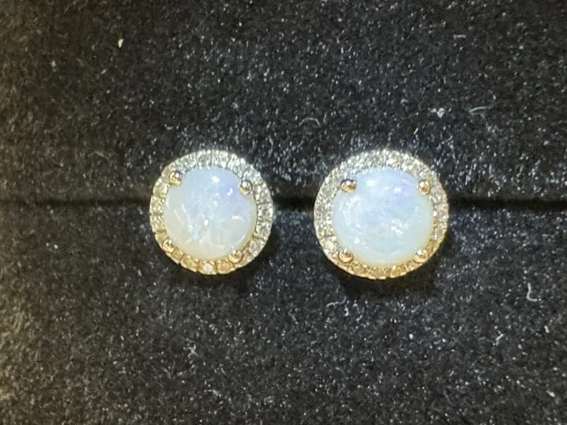 Round Opal Stud Earrings With 0.15 CT.T.W. Diamond Halo In 14k White Gold