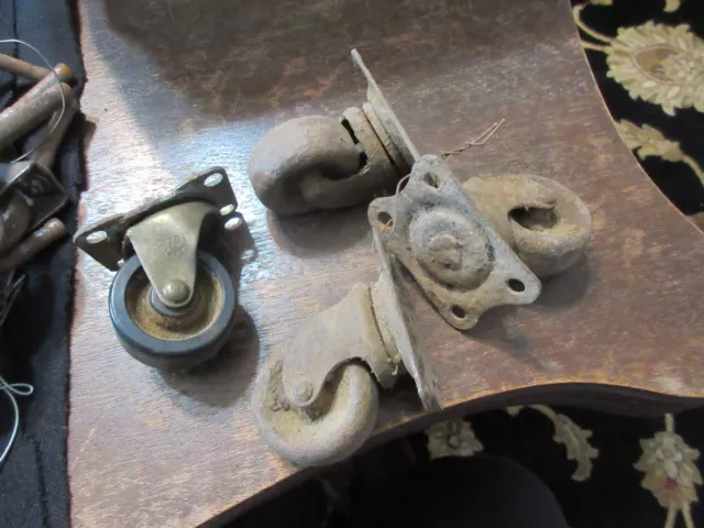 4 Vintage Casters Cast Iron 4 Holes Flat tops 1.5" wheels 1 rubber wheel nonmatc