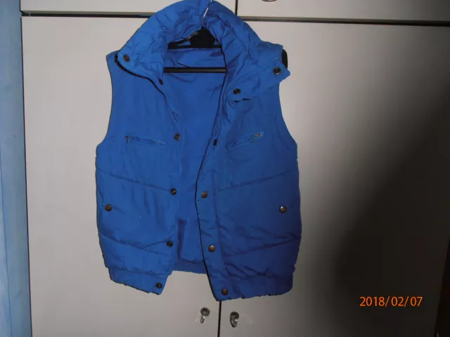 Veste matelassée bleu dur doublée sans manches avec zips taille 10 ans 