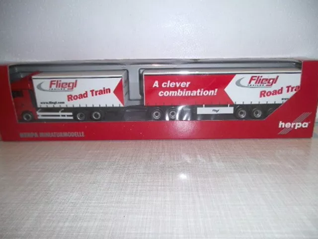 Herpa 1:87 MAN TGA XLX Gardinenplanen-Hängerzug "Fliegl" 153096 in OVP