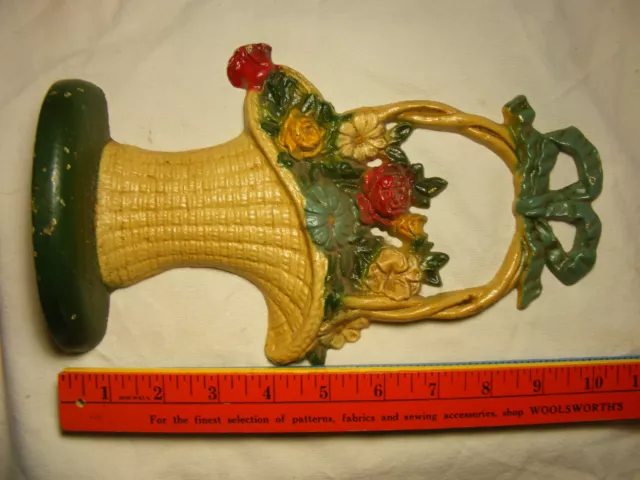 Doorstop Flower Basket marked 69 , about 10 1/2" tall  about 3+ pounds Cast Iron