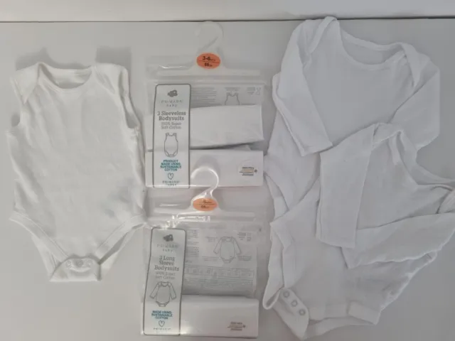 6 X White Bodysuits BNWT & Used. 3 x Sleeveless & 3 x Long Sleeves 3 - 6 Months