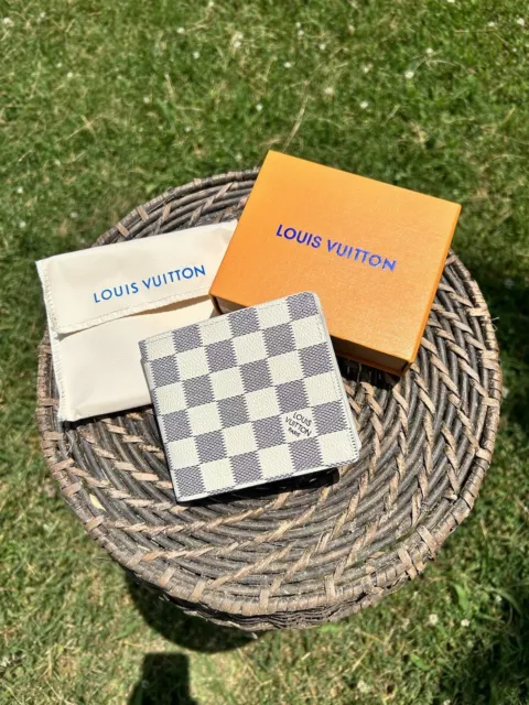 Louis Vuitton® Multiple Wallet Monogram Radiant Sun. Size in 2023