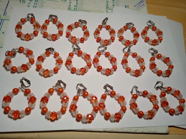 Lot Revendeur 9 Boucles D'oreilles A Clip. Anneaux Perle Orange Et Transparente