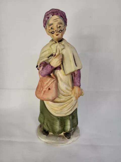 Vintage Norleans Ceramic Figurine Elderly Woman Dresses In Green And Pink Outfit