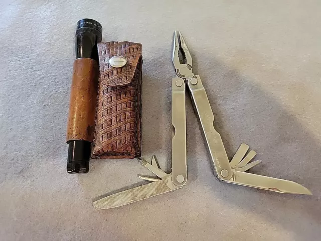 Vintage Original Leatherman Multi Tool With Mini Mag Light