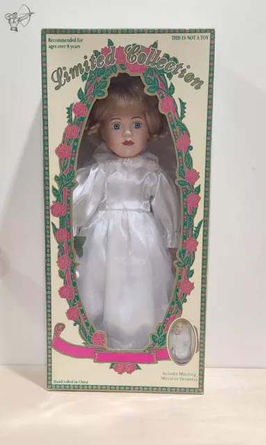Limited collection genuine porcelain doll and matching miniature ornament online