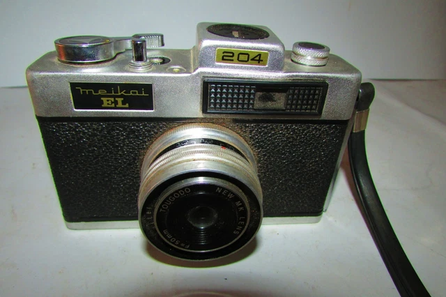 ~APARIENCIA COMO NUEVA~ Cámara fotográfica Meikai EL 204 con estuche